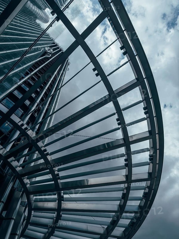 Abstract steel architecture structure against overcast sky