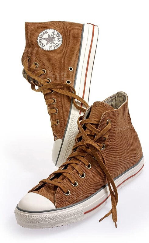 1 pair of shoes, sports shoes, Converse All Stars, in front of a white background, studio shot