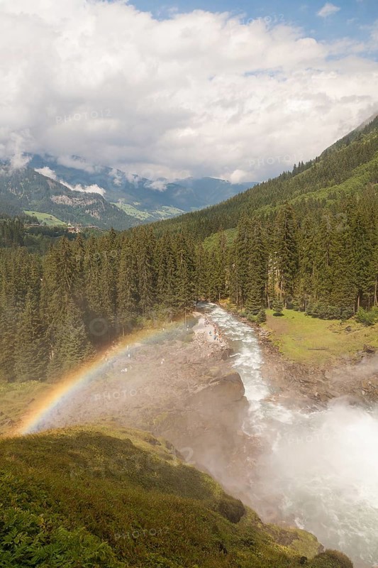 Krimml Waterfalls with rainbow. They have a total height of 380 metres (1, 247 feet) and are the highest waterfalls in Austria