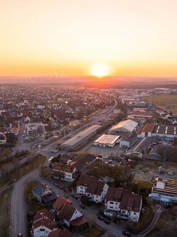 Industrial and residential areas of a small town at sunset, quiet atmosphere, Althengstett, district of Calw, Germany