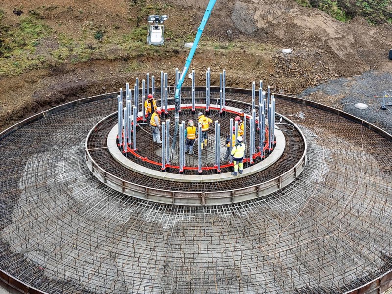 Concreting, concreting the foundation of a wind turbine, more than 600 cubic meters of concrete will be pumped into the foundation for over 7 hours, over 100 tons of reinforcing steel have been used, the wind turbine will have a hub height of 160 meters, part of a new wind farm in Sauerland, near Balve, North Rhine-Westphalia, Germany