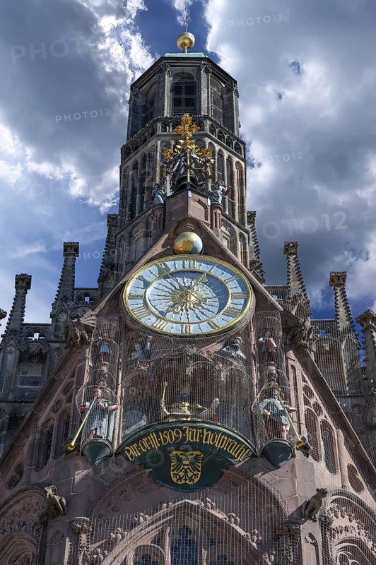 The tower, tower clock and the men's race of the Frauenkirchem Hauptmarkt, Nuremberg, Middle Franconia, Bavaria, Germany