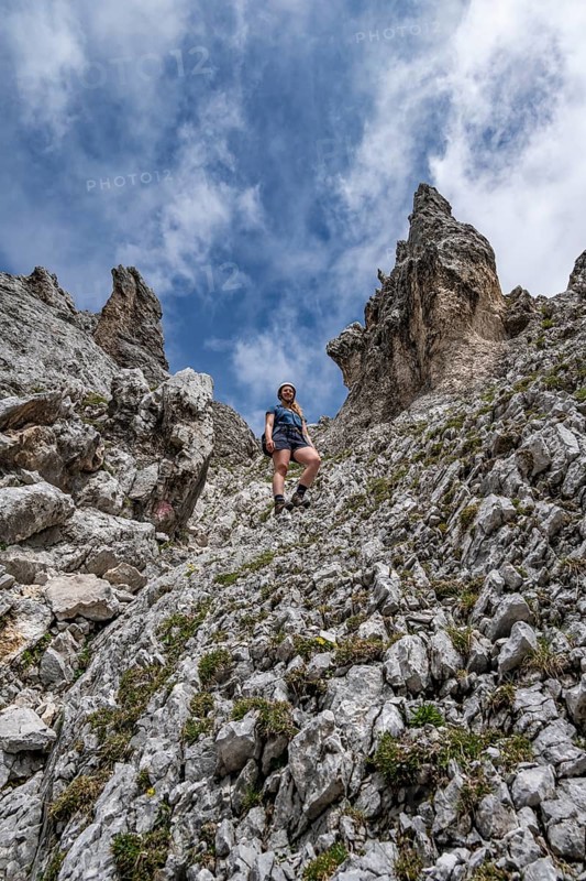 Mountaineer on the steep ascent to Waxenstein, Wetterstein Mountains, Garmisch-Patenkirchen, Bavaria, Germany