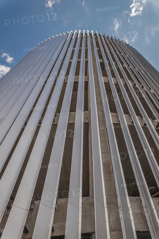 Metal profile siding wall of concrete building