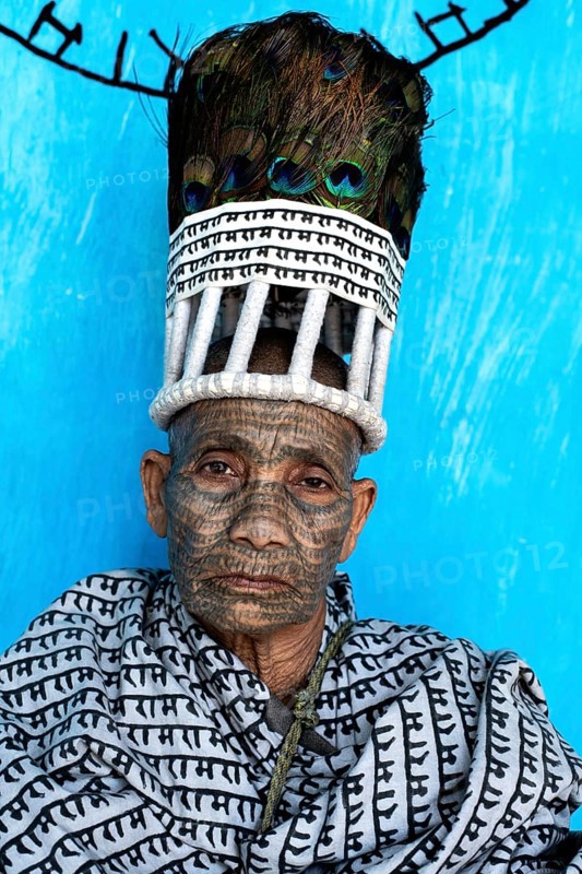 Portrait of a woman from the Ramnami caste (Chhattisgarh, India), As a sign of devotion, Ramnami people used to tattoo their body and their face with the name of Rama, one of the main hindu god. Nowadays, this tradition is disappearing. Indeed, few of them are still tattooed, the younger generation fearing discrimination if they do it. The caste (or sect) is born in the end of the 19th century as a way to protest against the supremacy of the higher classes in the hindu hierarchical system. Comprised of low caste hindus, they dont accept the caste system, they practise a form of bhakti (devotion) dedicated to the god Rama