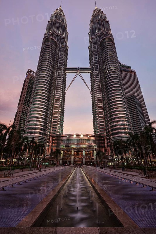KUALA LUMPUR, MALAYSIA, MAY 5: Petronas Twin Towers in twilight on May 5, 2011 in Kuala Lumpur. They were the tallest building in the world 1998-2004 and remain the tallest twin building