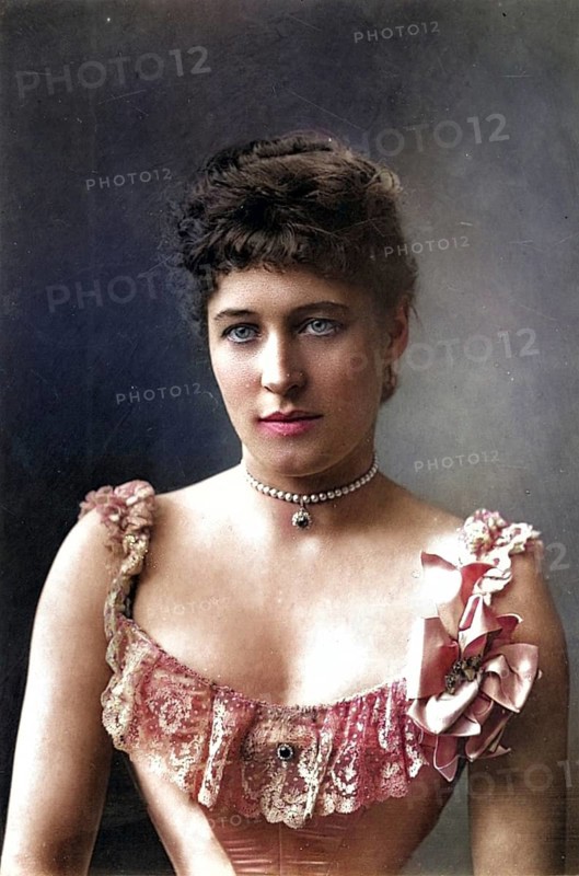 Lillie Langtry (1853-1929, born Emilie Charlotte le Breton), only daughter of the Dean of Jersey, was called the Jersey Lily. English society beauty and actress. Her extramarital lovers included Prince Louis of Battenberg and Albert Edward, Prince of Wales, who later became Edward VII. She became an American citizen in 1887. Woodbury type after a photograph by W & D Downey, ca. 1892, Historic, digitally restored reproduction from a 19th century original, Record date not stated