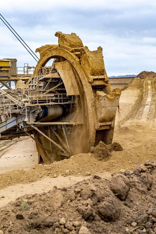 Opencast lignite mine Garzweiler 2, bucket wheel excavator 261 excavating the surface, at the rest of the hamlet Lützerath, bucket diameter is 17 metres, Erkelenz, North Rhine-Westphalia, Germany