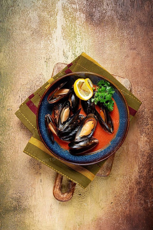 Fra Diavolo mussels, mussels in tomato sauce, Italian dish, on the table, top view, homemade, no people