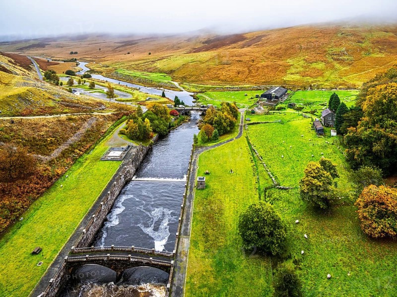 Autumn colors over Claerwen Dam, Claerwen Valley, Elan Valley Reservoir, Rhayader, Powys, Wales, UK