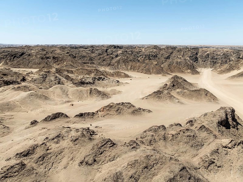 Aerial view, dry barren mountains in Moon Valley, rocky landscape ridged by erosion, Namib-Naukluft Park, Namib Desert, Namibia