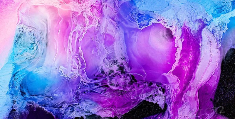 This abstract artwork displays a stunning blend of blue, pink, and purple hues, creating a liquids, dreamy texture reminiscent of a galactic landscape