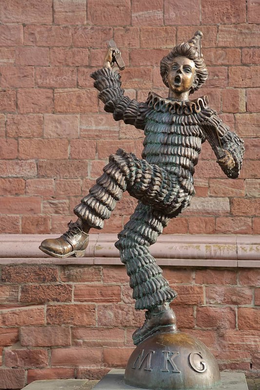 Sculpture of the Mainzer Klepper-Garde, jester with ruff on ball with inscription MKG, carnival club, dancing, cheerful, arms, above, carnival, carnival museum, provisions magazine, old town, Mainz, Rhine-Hesse region, Rhineland-Palatinate, Germany