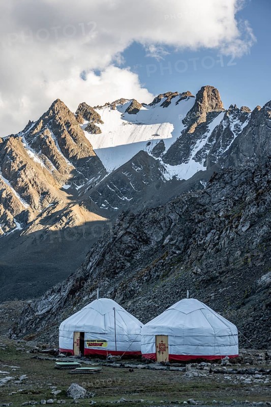 Yurts in a mountain valley in the Tien Shan Mountains, near Altyn Arashan, Kyrgyzstan