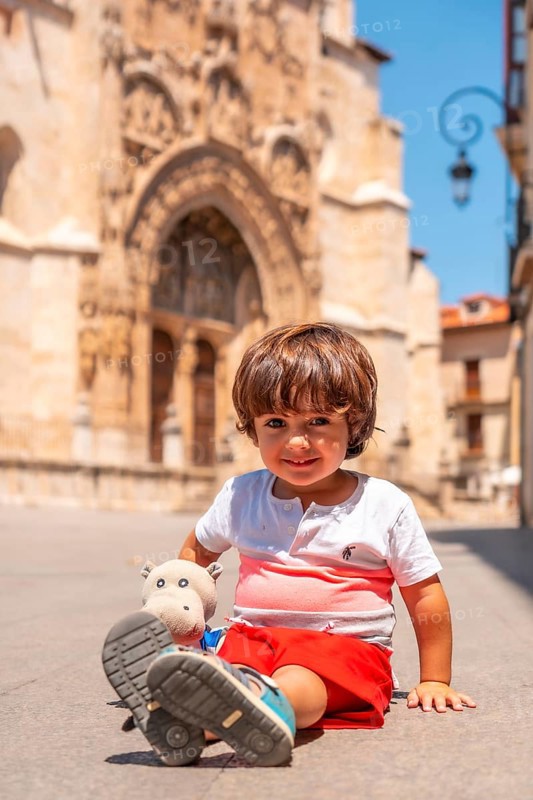 Child having fun in the church of Santa María la Real in Aranda de Duero in the province of Burgos. Spain