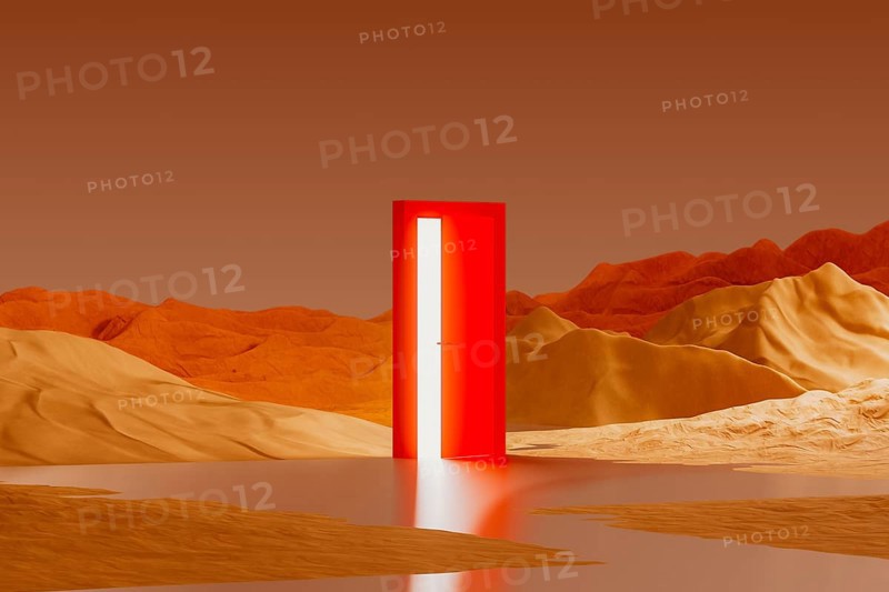 A bright, red door rests in the middle of a surreal desert landscape. A light glows from the door, reflected in a shallow body of water