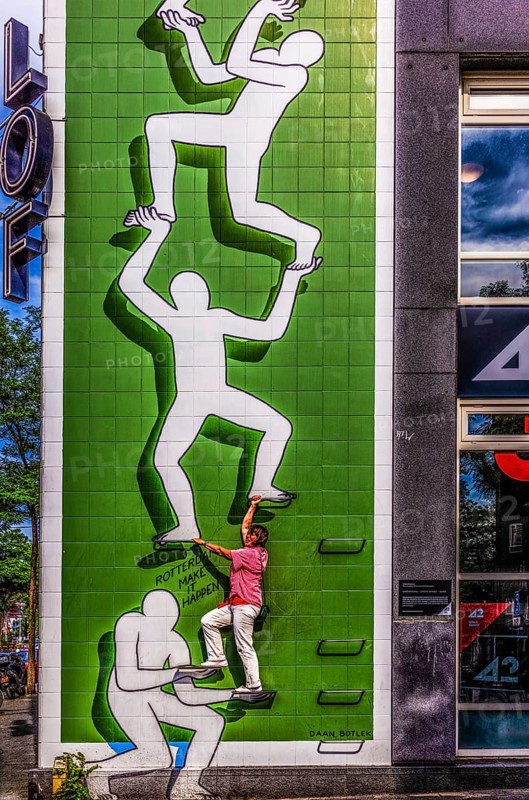Artwork from the Rotterdam Make It Happen street art campaign in the city center, invites passers-by to become part of the work of art through built-in steps, Rotterdam, the Netherlands
