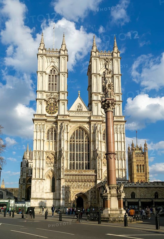Towers and frontage of Westminster abbey church with Victoria Tower in background, Westminster, London, England, UK