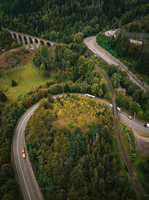 Winding road surrounded by forest and viaduct, Ravenna Gorge, Black Forest, Germany