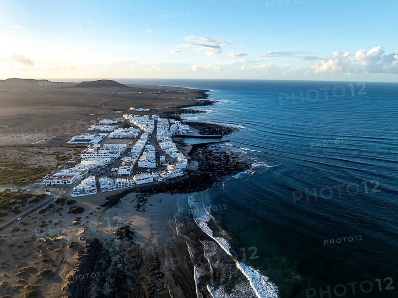 Caleta de Famara seaside location, aerial view, Lanzarote, Canary Islands, Spain