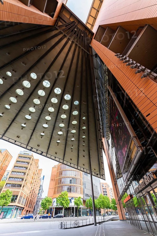 Tall, modern buildings with glass facades and geometric shapes that offer a broad urban perspective, Berlin, Germany