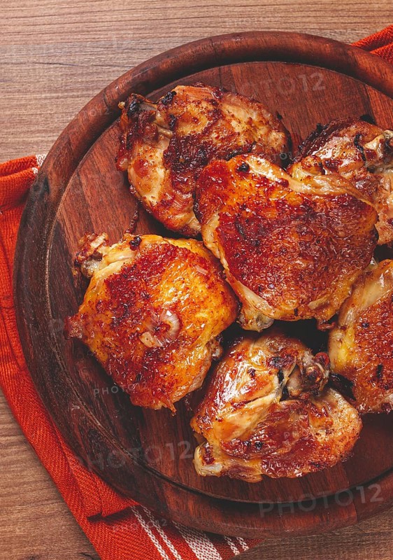 Fried chicken thighs, with spices, homemade, no people