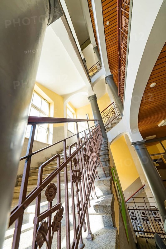 Historic staircase with arches and columns. Light falls through the windows, the structure looks impressive, Jugend Musiziert, Nagold, Germany