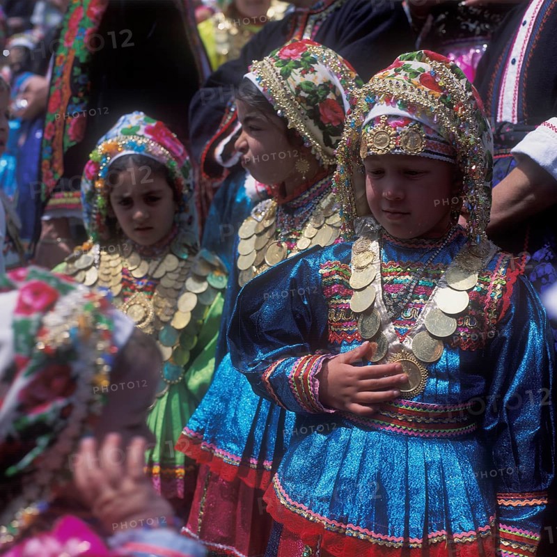 Kanakaries (girl) with gold jewellery, on Easter Tuesday (Lambri Tritti), Olymbos, Karpathos, Dodecanese, Greece