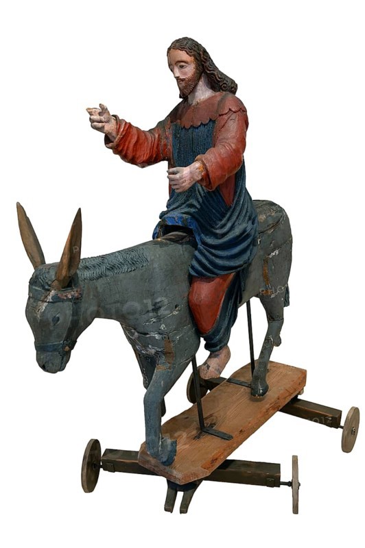 Christ on the palm donkey, on a white background, wooden figure from around 1400, Museum Bezau, Vorarlberg, Austria