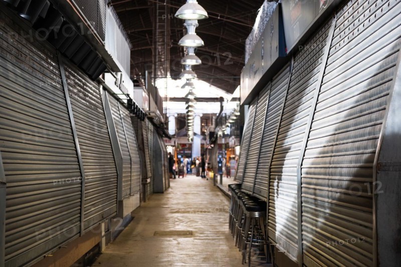 Closed market stalls in the Mercat de la Boqueria, famous market on the Ramblas in Barcelona, Spain