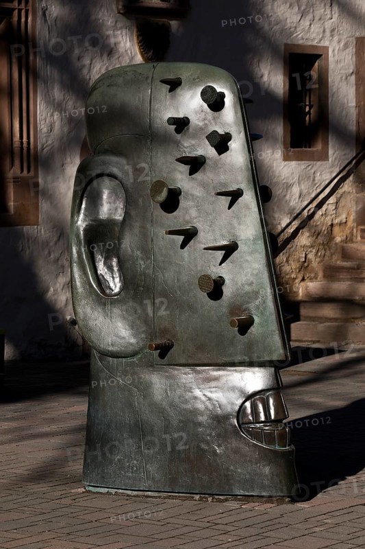 Bronze sculpture Goslarer Nagelkopf by Rainer Kriester at the town hall, Goslar, Lower Saxony, Germany