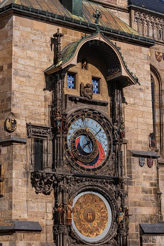Detailed view of Prague's iconic astronomical clock showcasing intricate medieval craftsmanship and rich historical architecture in the heart of the Old Town