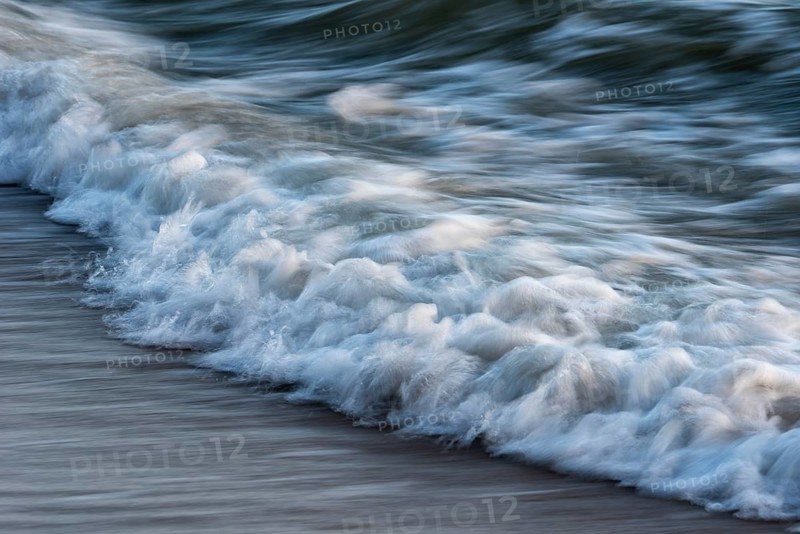 Wave play at sunrise on the chalk coast in Jasmund National Park, Rügen, Sassnitz, Mecklenburg-Western Pomerania, Germany
