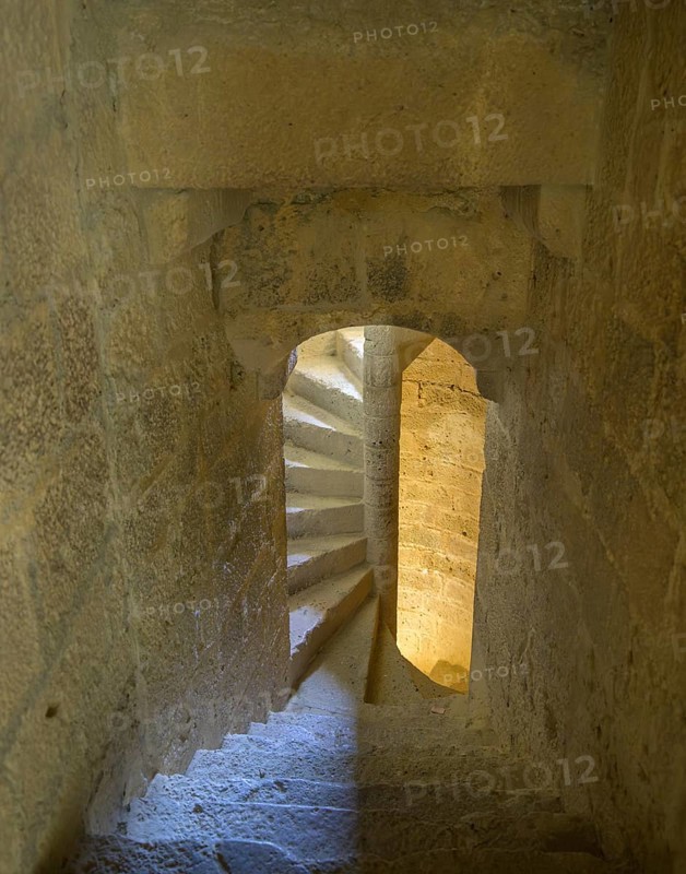 Stone spiral staircase up to the tower in the Cathar castle of Quéribus, Cucugnan, Département Aude, France