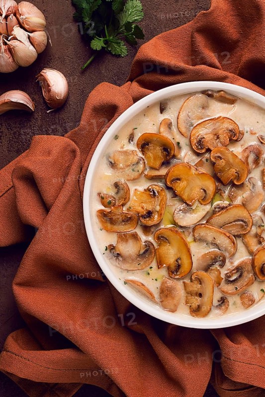 Champignons in creamy garlic sauce, with herbs and spices, gravy, sauce, no people