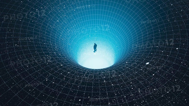 A man stands at the edge of a black hole, gazing into the depths of the universe, surrounded by stars in a mesmerizing cosmic abyss