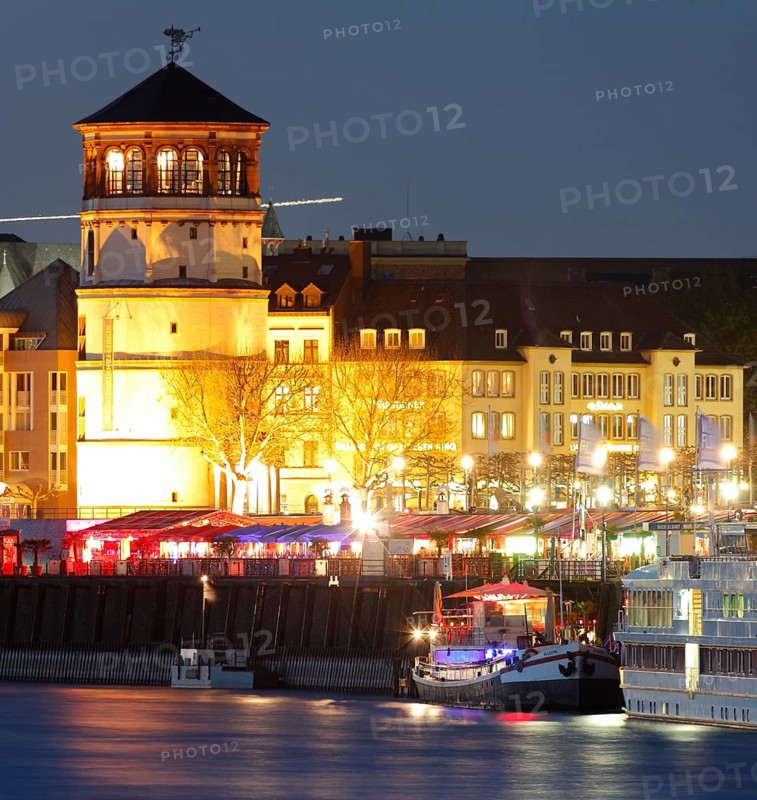Nocturnal bank of the Rhine, with castle tower and St Lambertus, Düsseldorf, North Rhine-Westphalia, Germany
