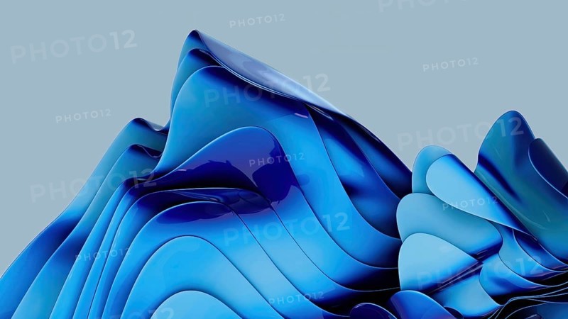 A mesmerizing abstract image with fluid blue waves creating a dynamic sense of motion and depth, against a neutral background, evoking tranquility and creative energy