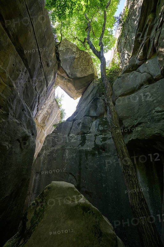 Trapped boulder in the Jardin du Roi, Grés d'Annot sandstone labyrinth hike, Alpes-de-Haute-Provence, France