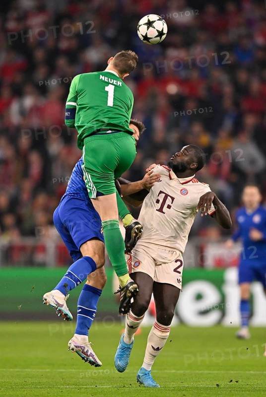 Goalkeeper Manuel Neuer FC Bayern Munich FCB (01) is injured in a duel with Bruno Petkovic GNK Dinamo Zagreb (09) and Dayot Upamecano FC Bayern Munich FCB (02) Champions League, Allianz Arena, Munich, Bavaria, Germany