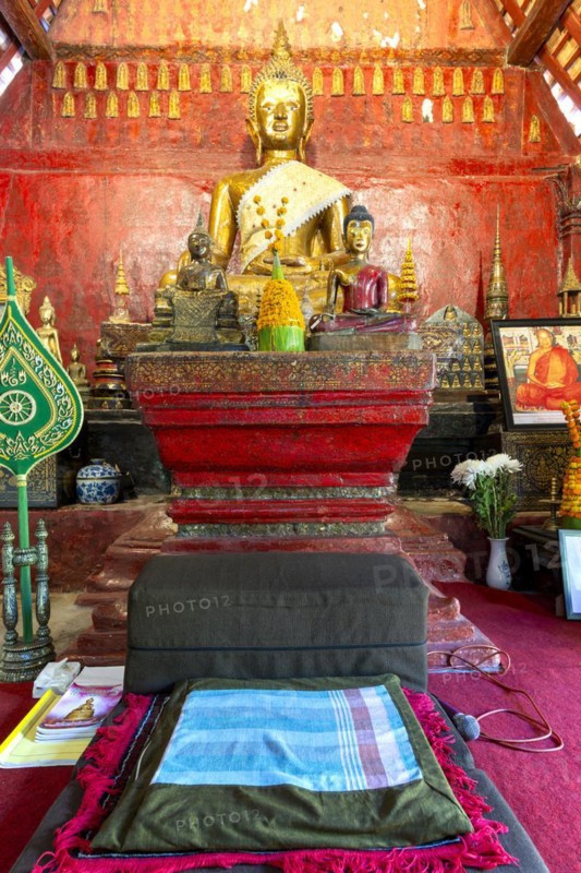Golden Buddha statue, Bhumispara-mudra, Buddha Gautama at the moment of enlightenment, Wat Long Koon, Luang Prabang, Laos