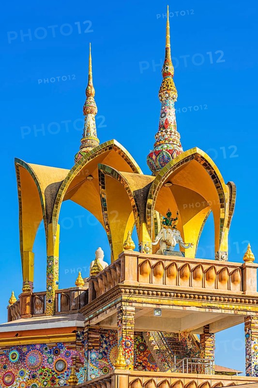 Round arch pavilions decorated with colorful mosaics and glass works of art, Buddhist temple complex Wat Phra That Sorn Kaew, Phetchabun province, Thailand