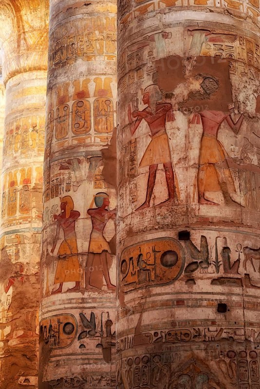 Ancient Egyptian Pharaonic Hieroglyphic relief details on columns of the Great Hypostyle Hall of the Temple of Karnak, Luxor, Egypt