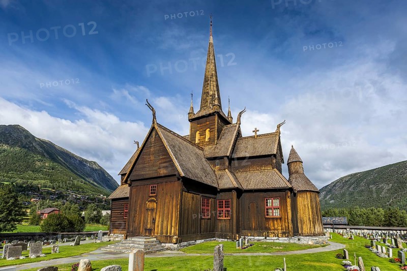 Lom Stave Church (Lom stavkyrkje) with cemetery in the foreground, Lom, Norway