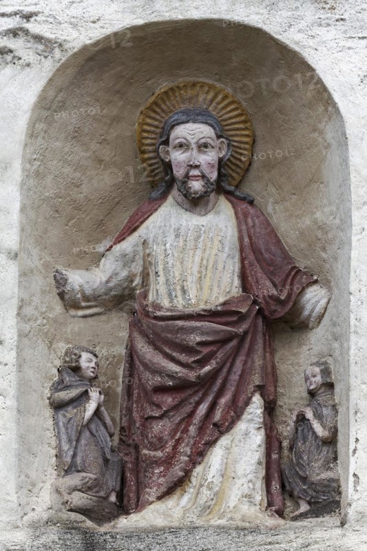 Blessing Christ, figure above the entrance, early Romanesque monastery church of St. Cyriak, Sulzburg, Markgräflerland, Upper Black Forest, Baden-Württemberg, Germany