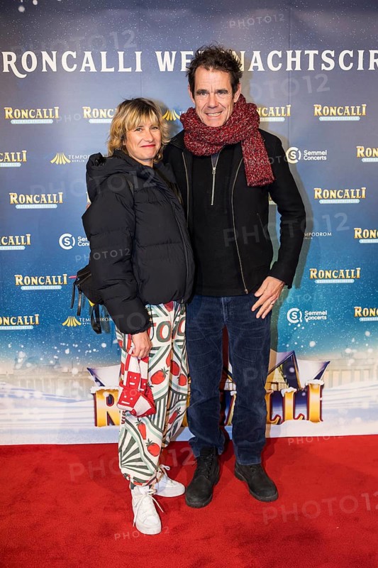 Marie Steinmann and Tom Tykwer at the premiere of the 20th Original Roncalli Weihnachtscircus in Berlin's Tempodrom on 20 December 2024