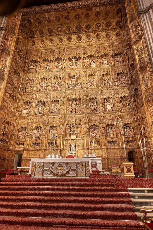 Magnificent baroque altar with rich decorations and religious motifs, Seville, Andalusia, Spain