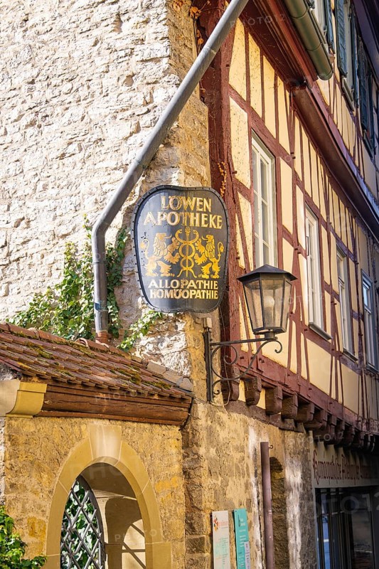 Former pharmacy in a half-timbered building with historic sign, Schwäbisch Hall, Germany