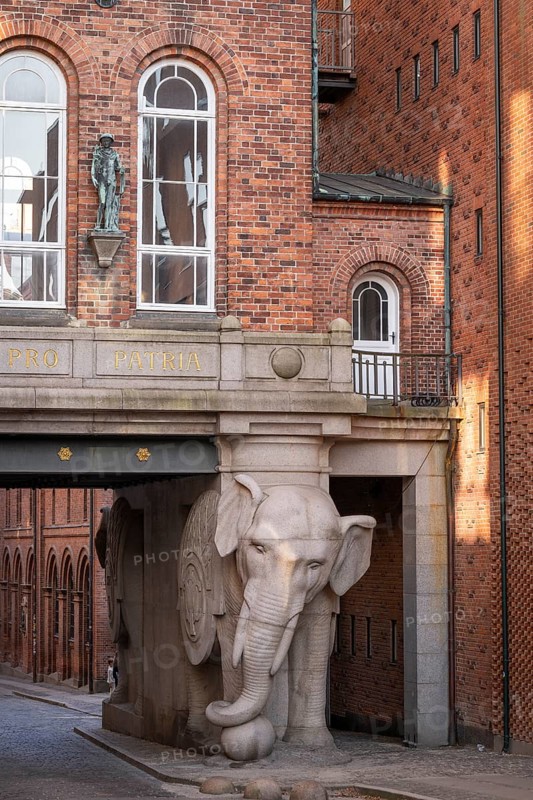 Monumental stone elephant, elephant gate or elephant portal or Elefantporten, by architect Vilhelm Dahlerup, Carlsberg district, Copenhagen, Denmark