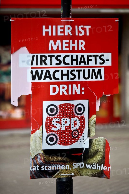 Destroyed SPD election poster in the pedestrian zone of Wattenscheid, Bochum, Ruhr area, North Rhine-Westphalia, Germany